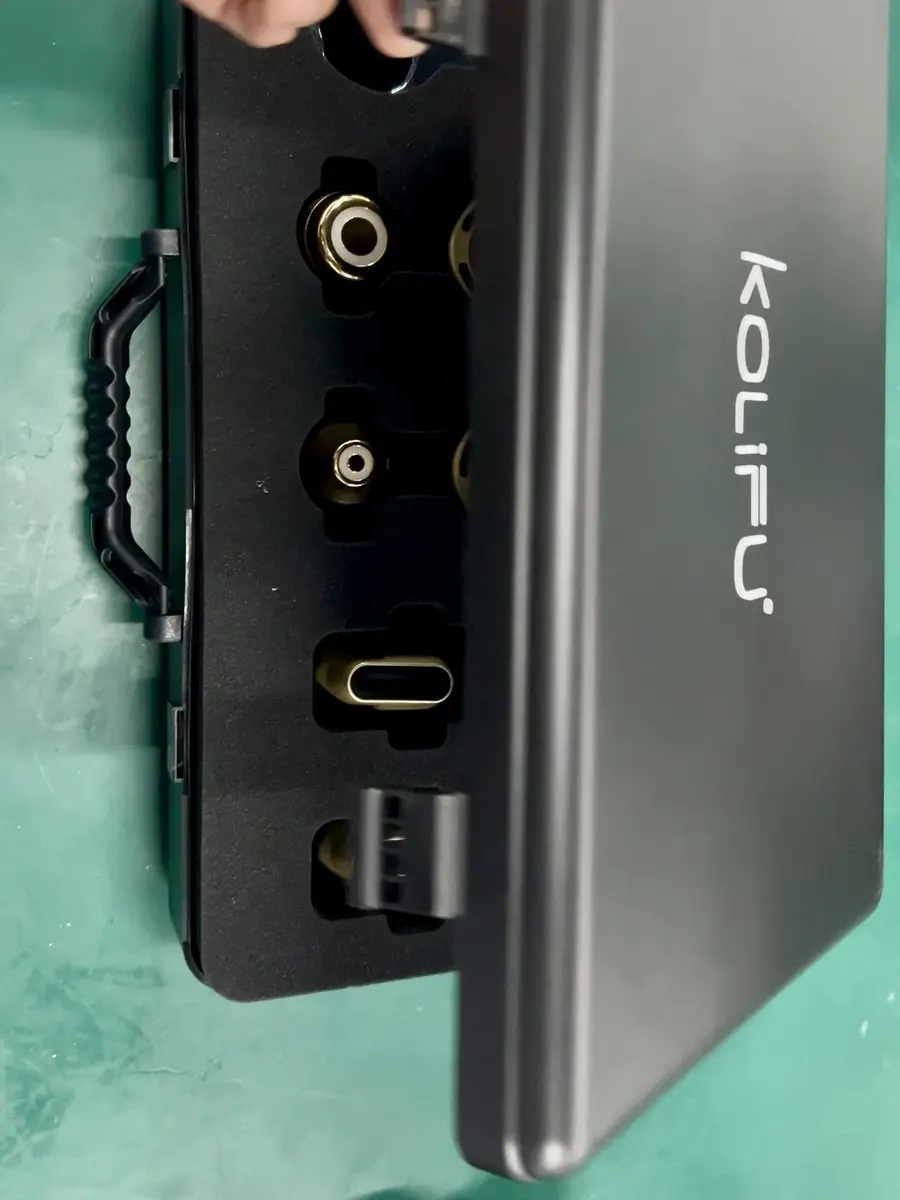 Detail of an in-house injection molded and CNC finished housing port on a KOLIFU device
